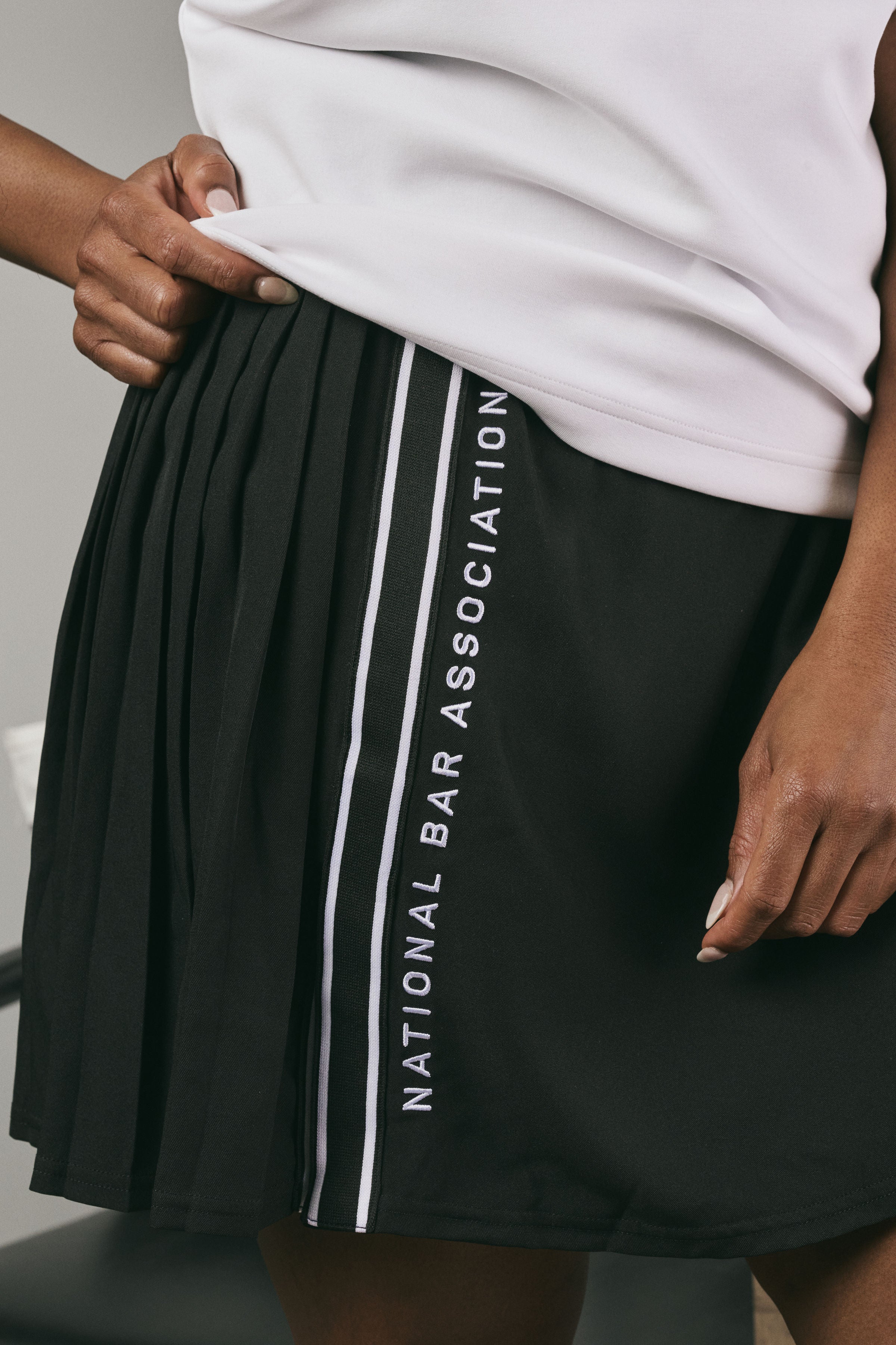 Black skirt with 'National Bar Association' text on a grey background