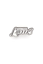 White and black lapel pin with the text 'Call Your Lawyer' on a white background
