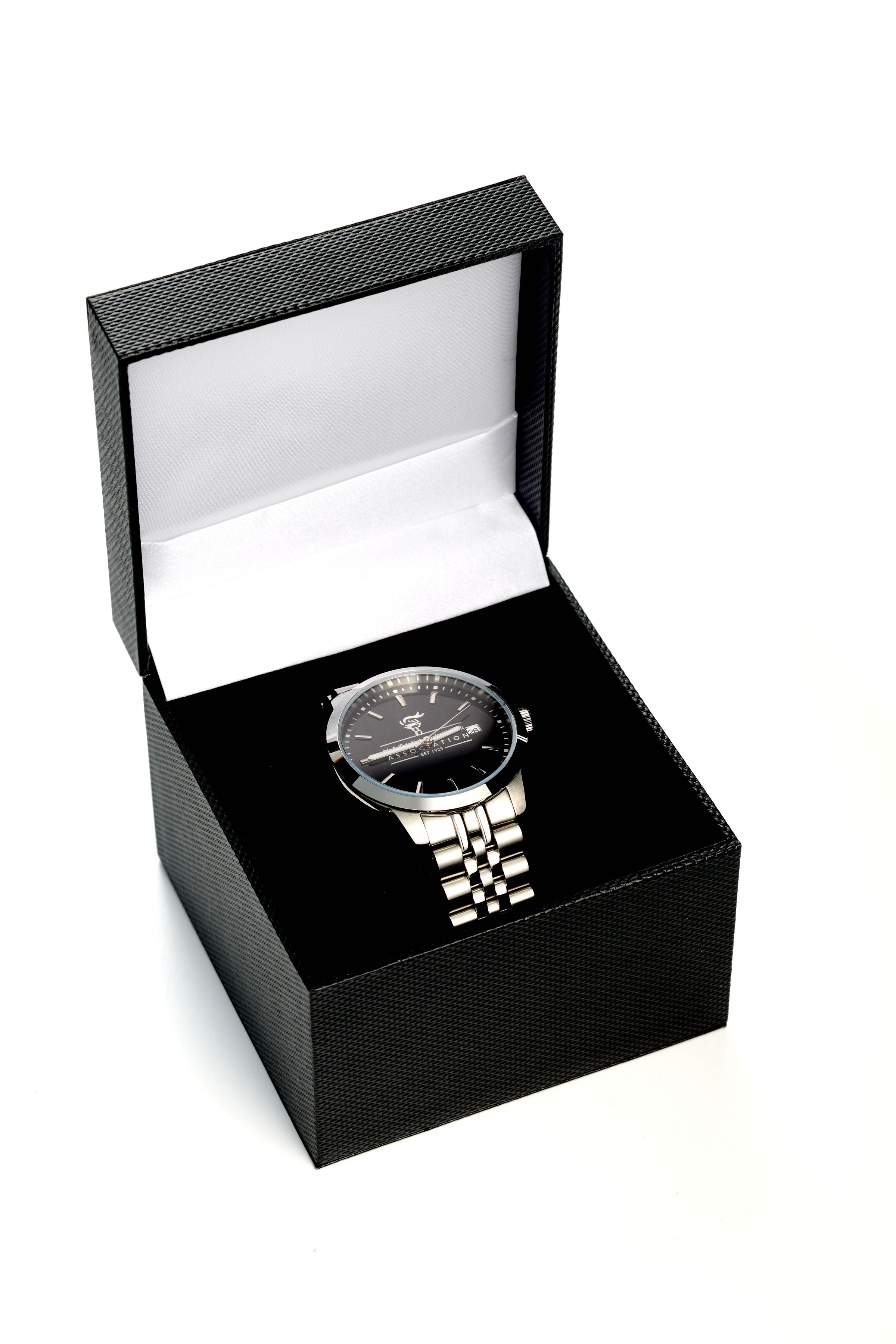 Silver watch in a black open box on a white background
