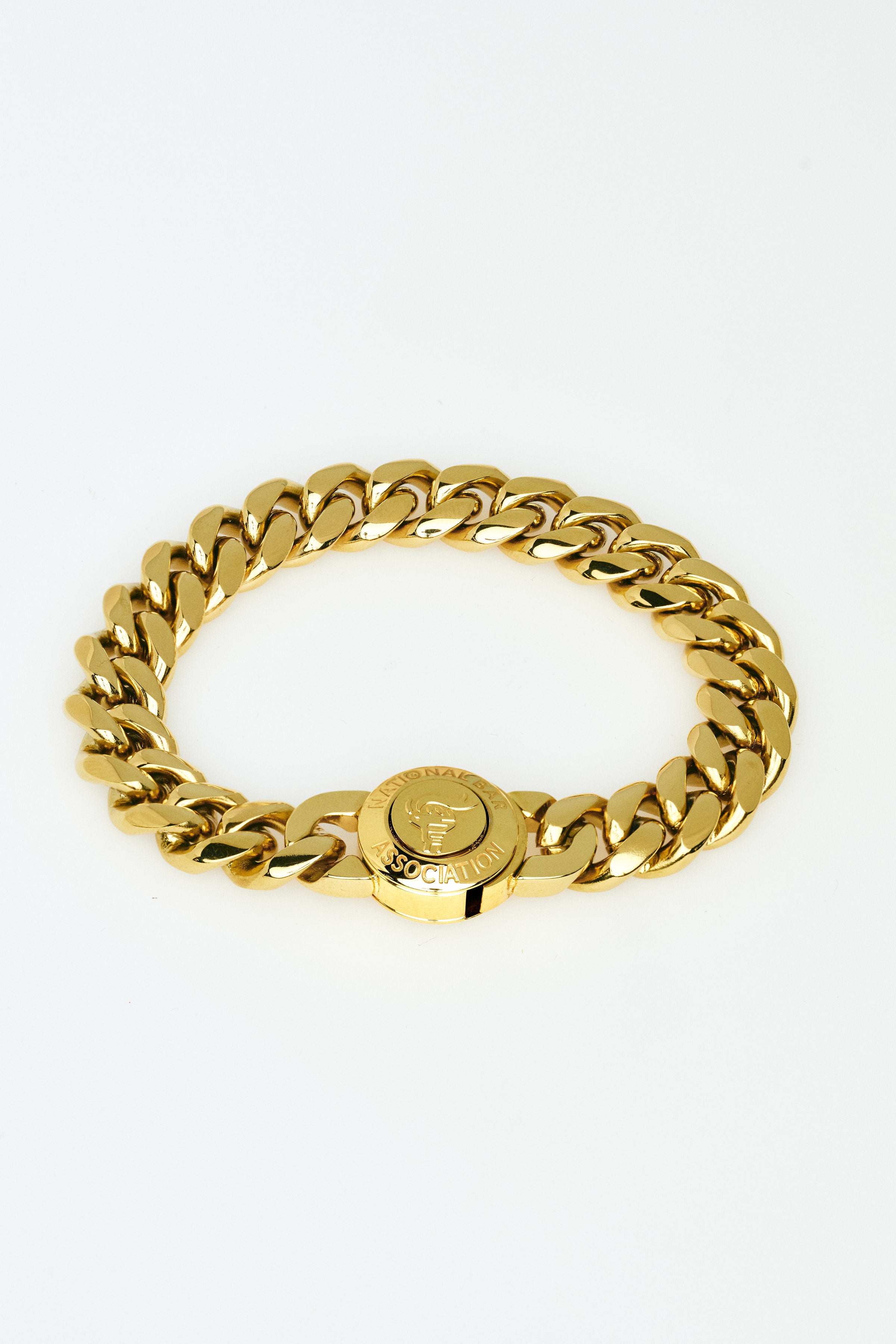 Gold chain bracelet on a white background